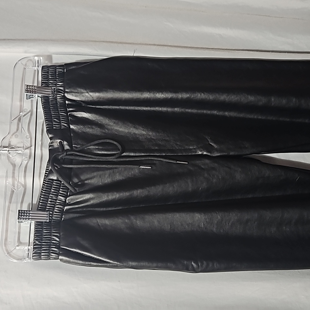 SAINTS FAUX LEATHER PANTS